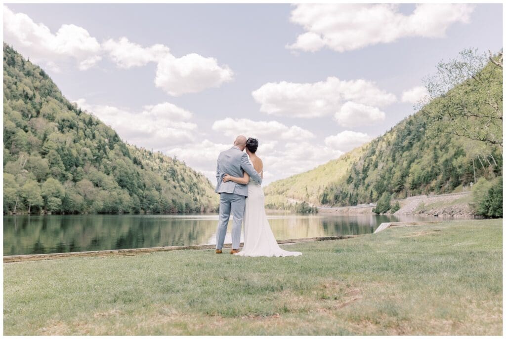 Saying vows in a private lakeside setting surrounded by the mountains is something an Adirondack Elopement Photographer can help you plan so it's perfect for your big day.