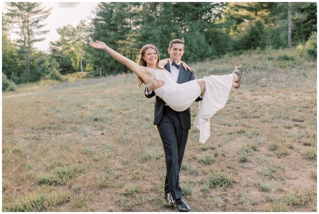 Couple celebrating their elopement at sunset in the Adirondacks in the mountains. This blog gives 10 reasons why elopements are better than weddings.