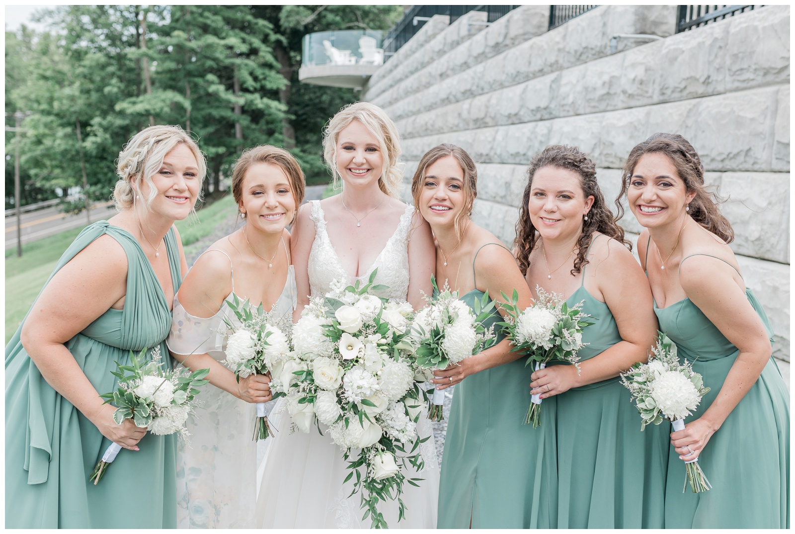 Bridal party of bride and bridemaids at the Inn at Taughannock.