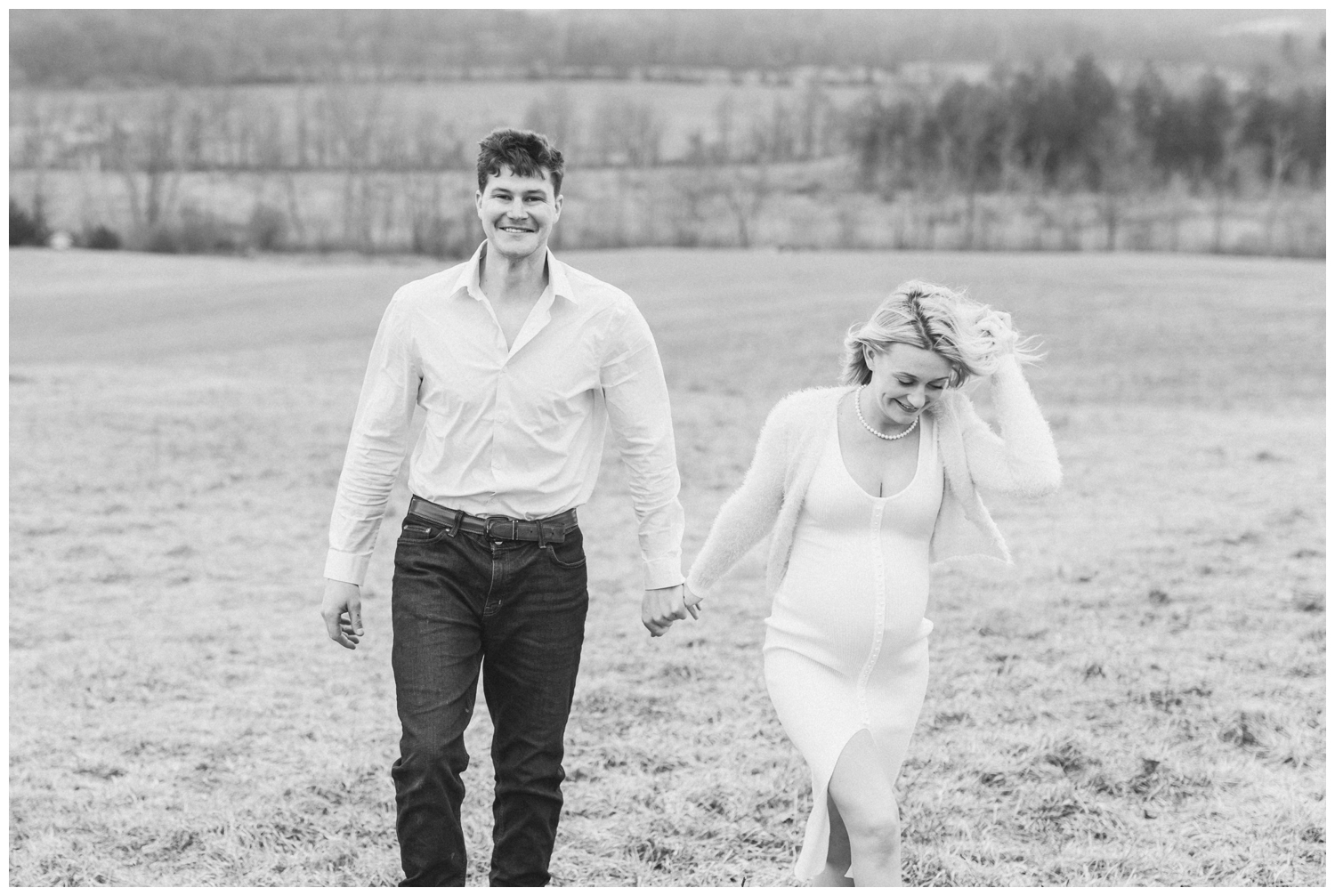 Black and white classic image of a soon to be mom and dad during their maternity session in the Catskill Mountains.
