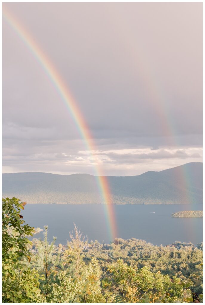 Double rainbow over Lake George, NY at the top of a hike in the Adirondack Mountains.
