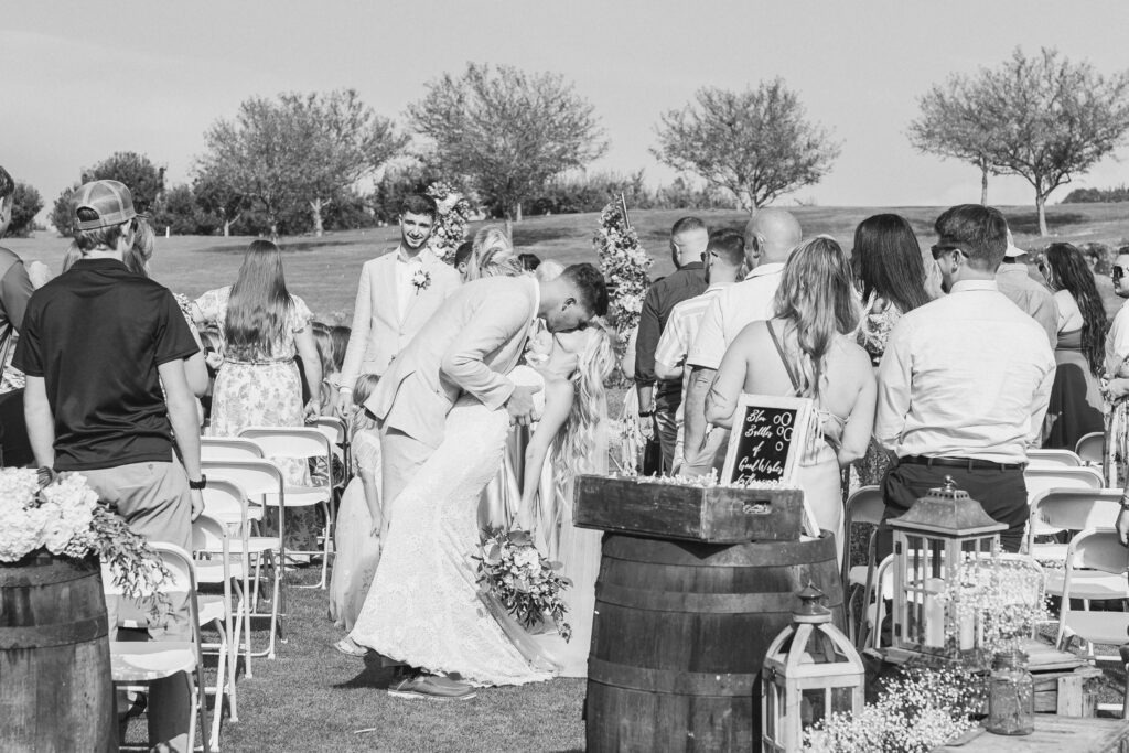 bride and groom kissing during their adirondack elopement ceremony