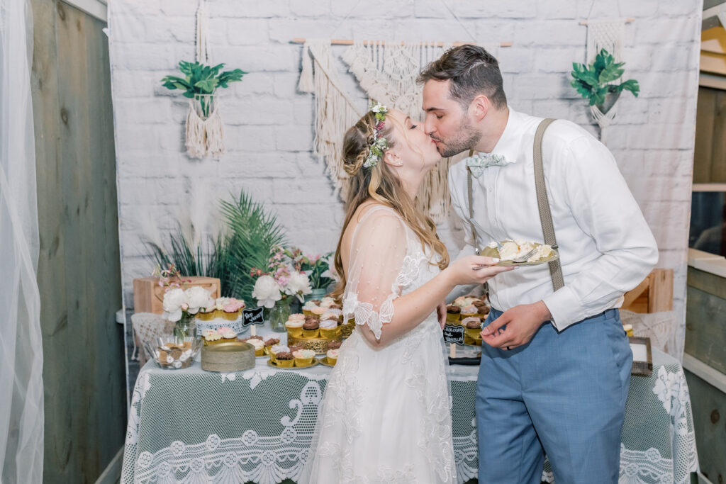 bride and groom eating cake