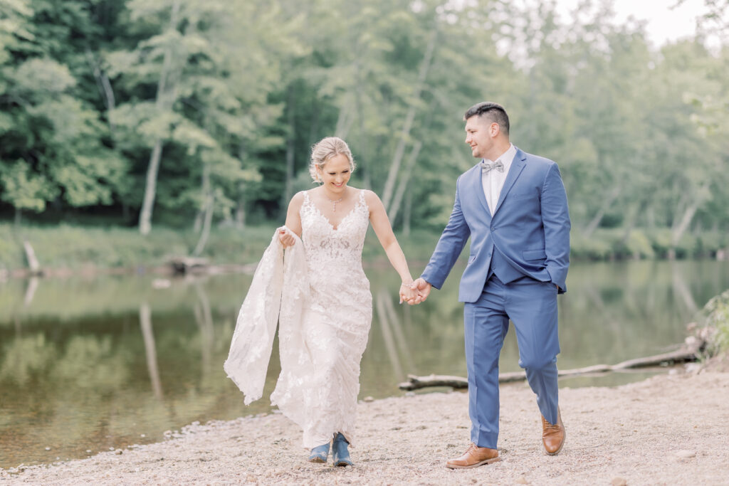 romantic bride and groom portrait surrounded by lush greenery for their Lake George elopement in the Adirondacks