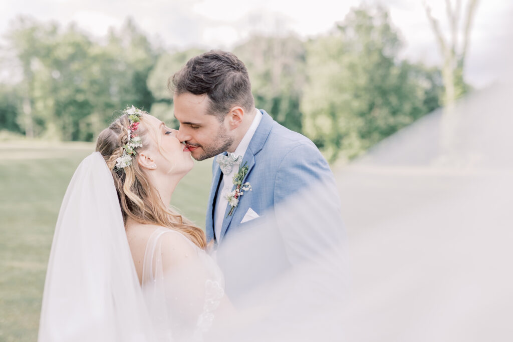 romantic bride and groom kissing photo