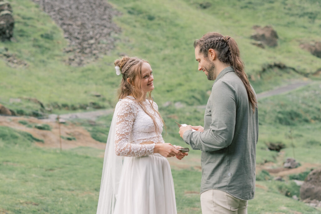 bride and groom Adirondack elopement ceremony, both exchanging private vows