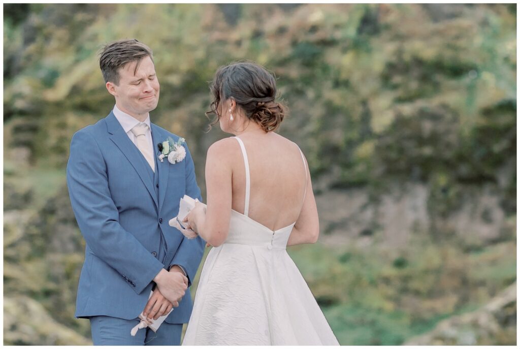 Emotional Groom during an intimate ceremony in Iceland on their wedding day.
