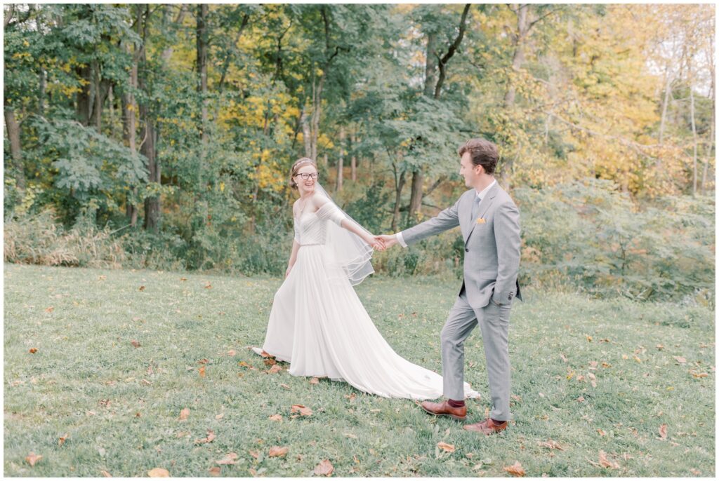 bride and groom outdoors during their lake placid elopement day