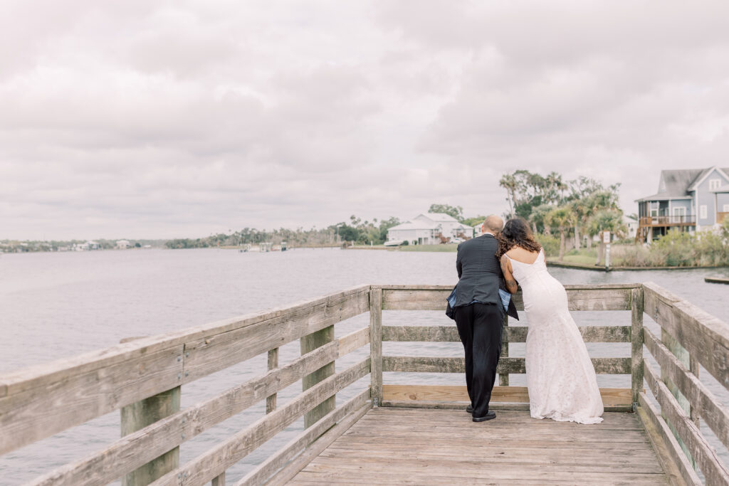 bride and groom gazing upon Crystal River