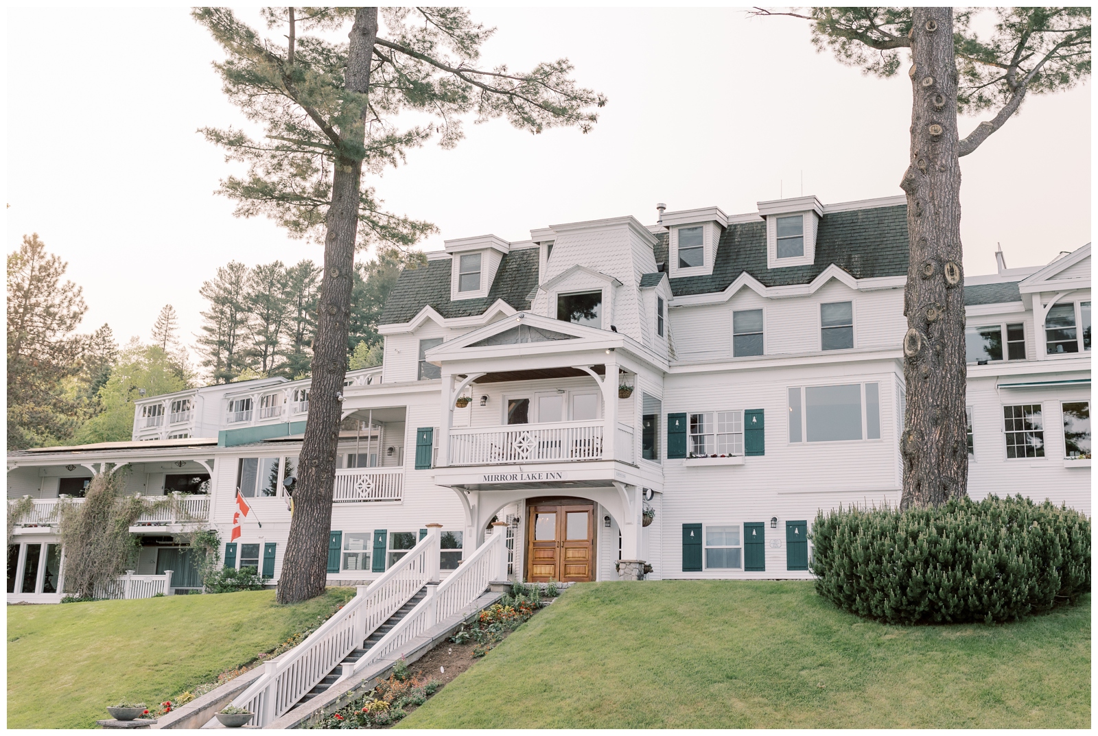 A wide photo of Mirror Lake Inn in Lake Placid, NY

