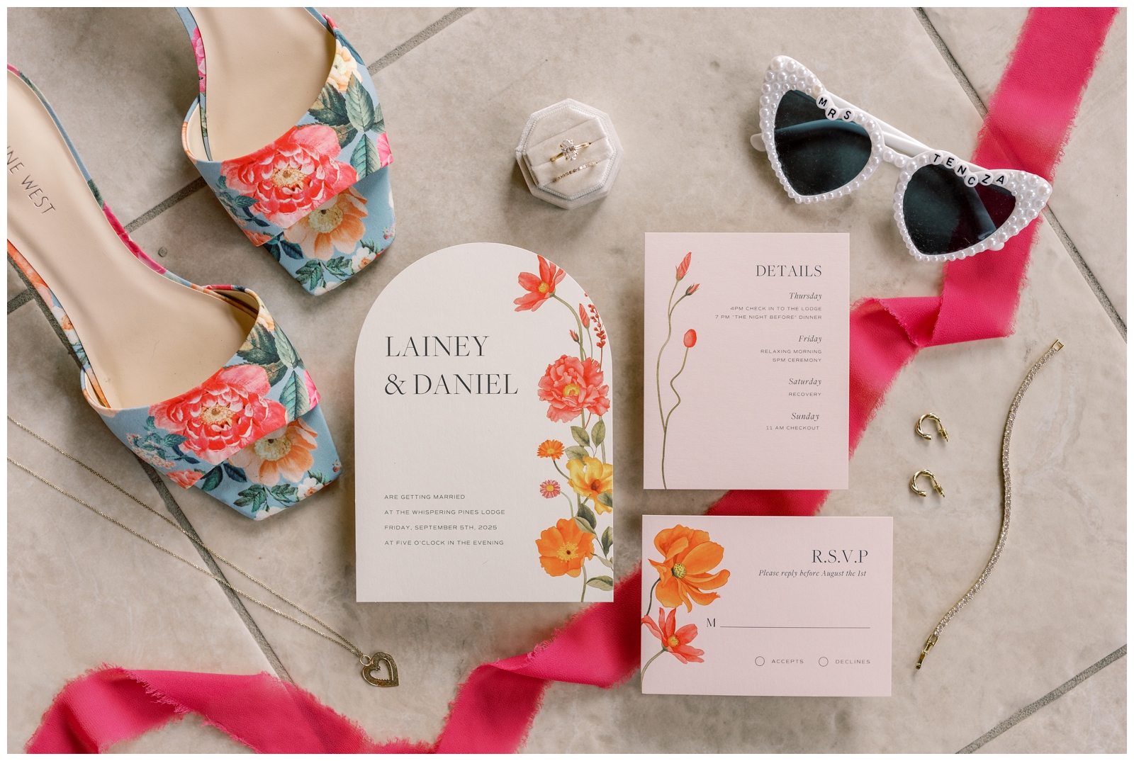 Bright colored wedding details in a flatlay.
