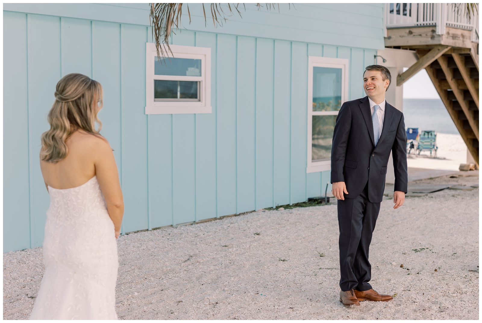 Bride and Groom sharing a first look on the beach in Florida during their micro wedding.