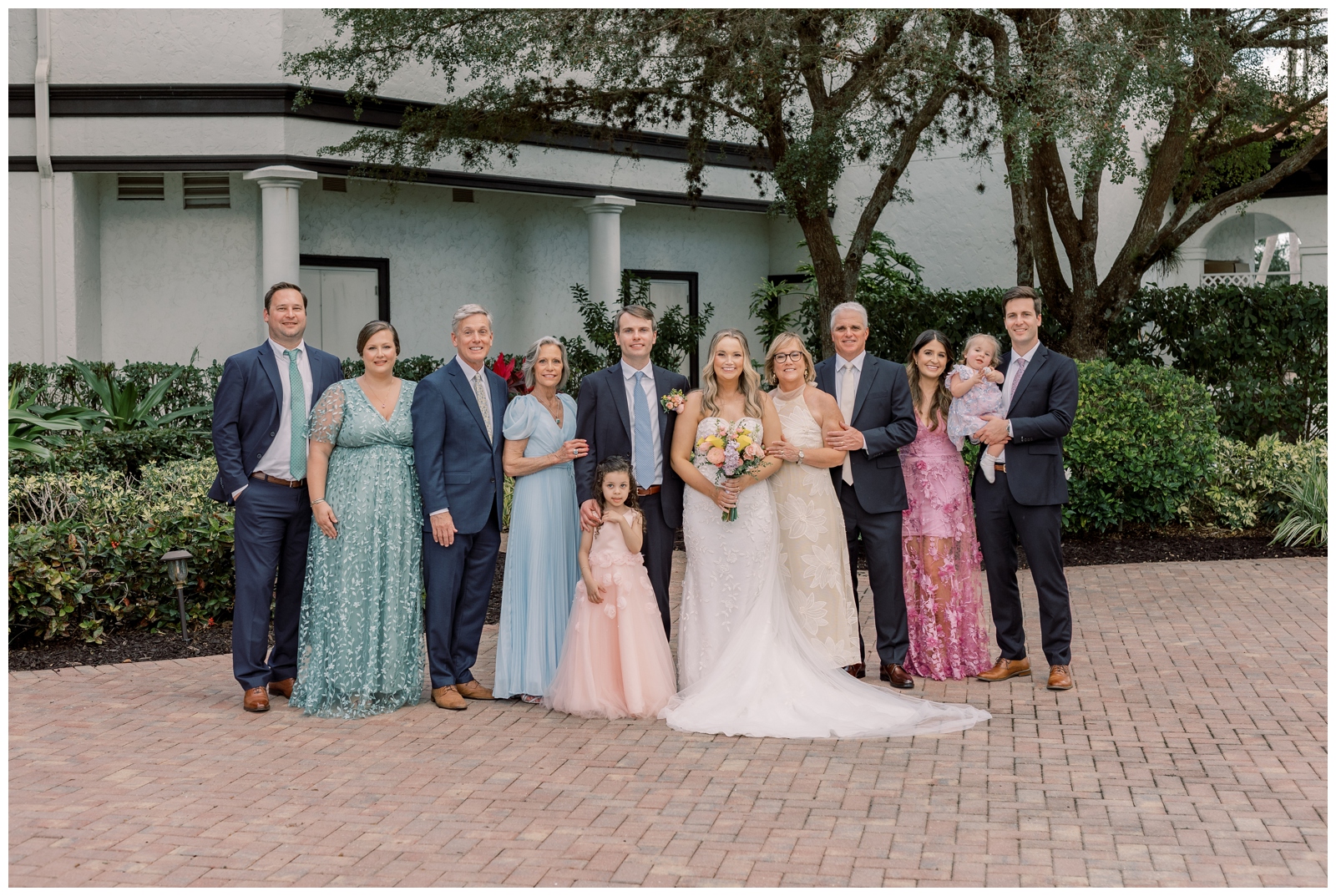 Family portrait during a micro wedding in Fort Myers, Florida.