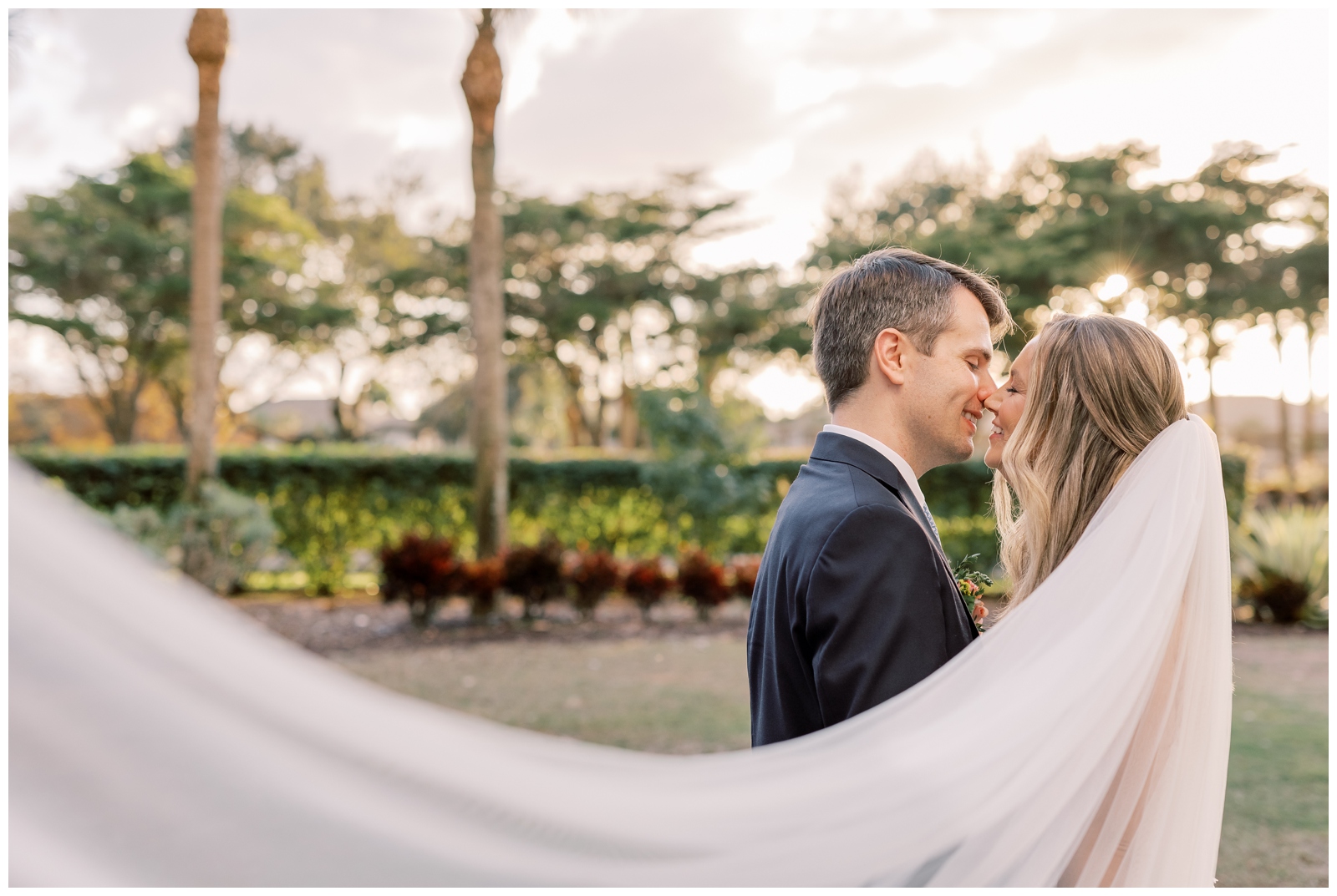 Bride and Groom about to kiss during sunset photos on their wedding day while celebrating their elopement.